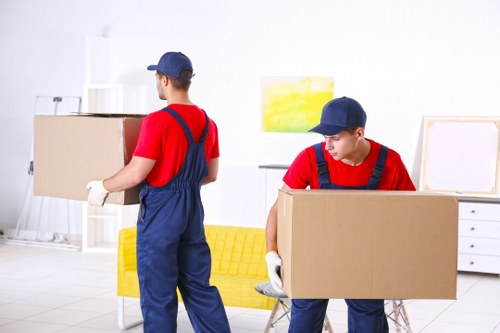 Furniture pick-up service removing bulky household items in Chelsea