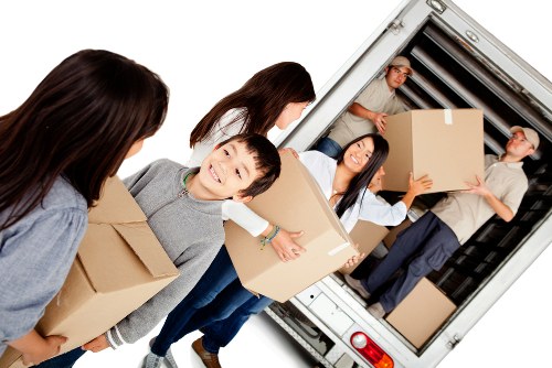 House removalists in Chelsea loading furniture into a moving truck