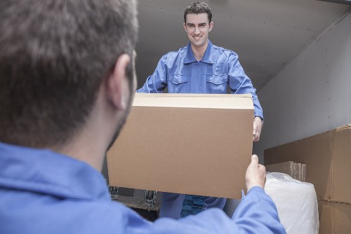 Removal team preparing a transparent quote for a Chelsea flat move