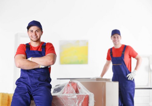 Professional furniture removals team handling a Chelsea home move