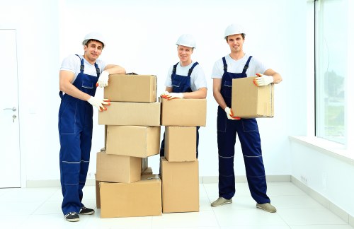Chelsea removals team packing household items carefully