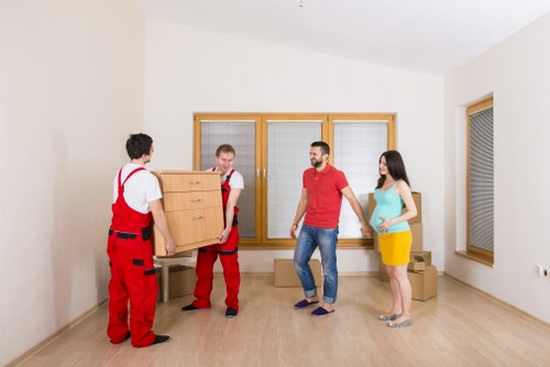 Student removal team helping with boxes and furniture in Chelsea