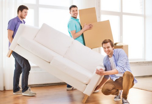 Professional movers loading furniture in Chelsea
