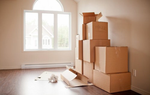 Moving van and removal crew handling a Chelsea property move