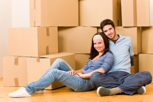 Packed boxes ready for a Chelsea flat move with local access planning
