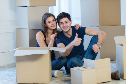 Chelsea moving team organizing belongings during unpacking services