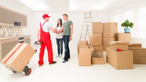 Organised Chelsea storage space with boxes, furniture, and archived items