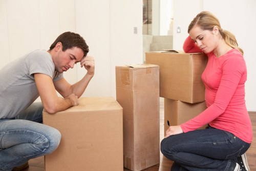 Insured removal specialists handling furniture carefully