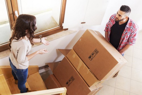 Packed boxes and furniture prepared for Chelsea house removals