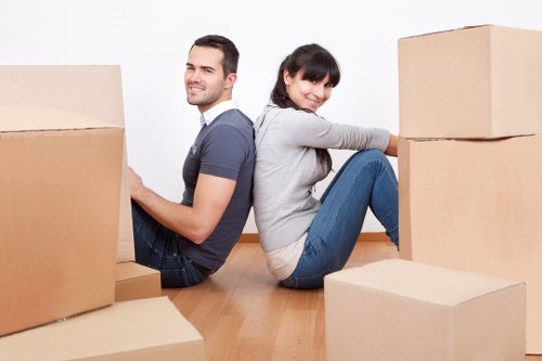 Moving van and packed boxes during a Chelsea relocation
