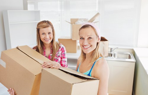 Packed office equipment prepared for relocation services in Chelsea