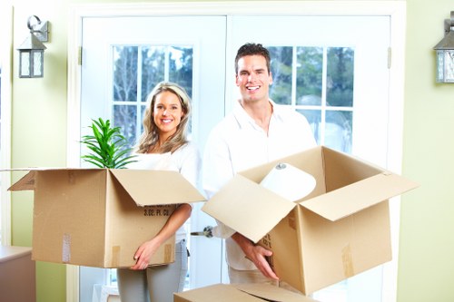 Chelsea removalists unloading boxes and furniture at a new home