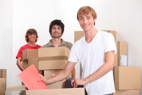 Packed business items ready for transport during a Chelsea office relocation